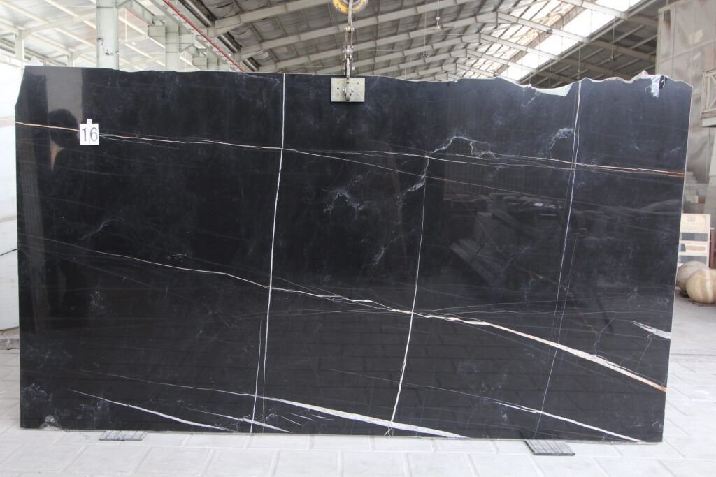 Noir Sahara marble slab, black with bold white and golden veins